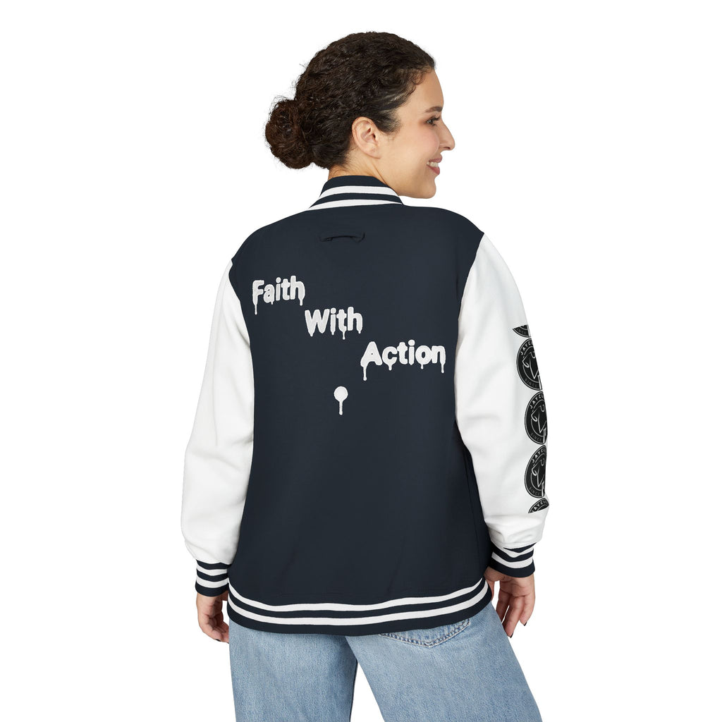 Back view of a woman wearing a black and white Faith In Motion Varsity Jacket with "Faith With Action" text.